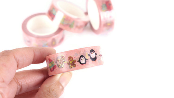 All things Christmas on pink washi tape with gold foil accents