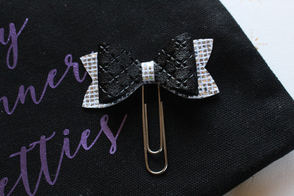 Black and silver planner bow clip