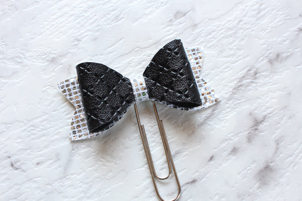 Black and silver planner bow clip